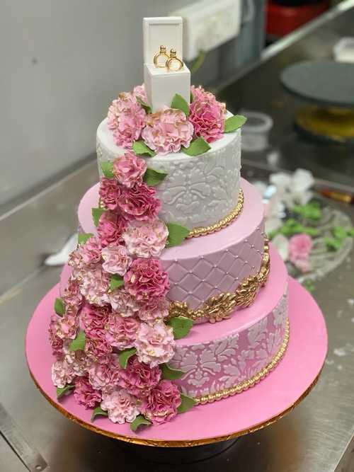 A pink birthday cake with big bow on top - Decorated Cake - CakesDecor